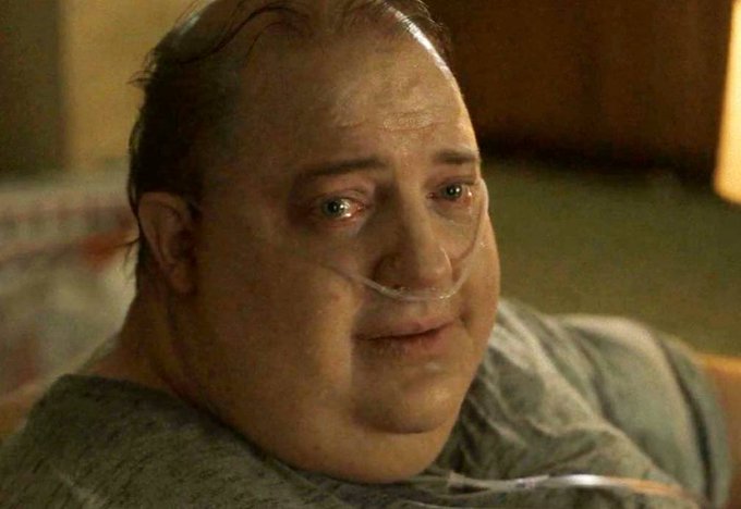 A heavyset man lies in a hospital bed with a nasal cannula, his eyes red and welling with tears as he stares blankly ahead, capturing the defeated, exhausted expression the meme uses to portray market bears who can no longer offer optimism about a recovery, instead just silently watching investors suffer losses.