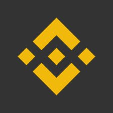 The image displays the Binance logo, a yellow geometric diamond-like symbol on a dark gray background. This logo represents the cryptocurrency exchange platform behind the newly announced stock trading service that has surpassed $1 billion in assets under management within just 30 days of its launch.