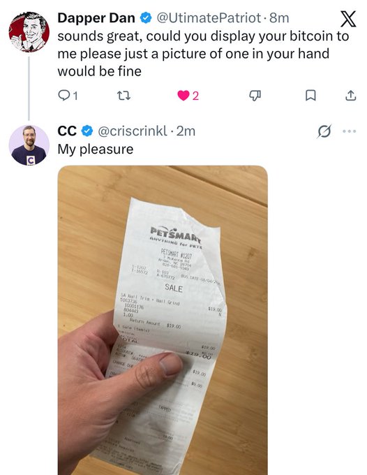 A Twitter exchange where Dapper Dan (@UltimatePatriot) asks CC (@criscrinkl) to display his bitcoin, and CC responds with 'My pleasure' followed by a photo of a hand holding a PetSmart receipt for $19.00.