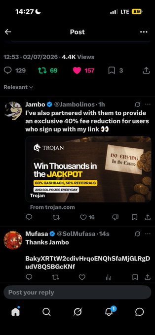 Mobile screenshot of a social media post by 'Jambo' promoting a 40% fee reduction partnership with Trojan, followed by a reply from 'Mufasa' containing a promo code.