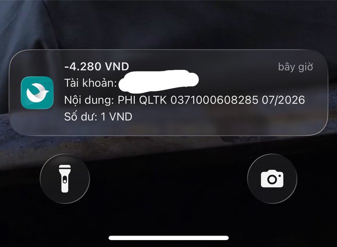 A phone screenshot of a Vietnamese payment notification from an app showing -4,280 VND with transaction details 'PHI QLTK 0371000608285 07/2026', with the account name redacted.