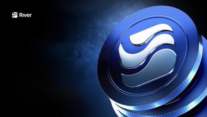 The image features a blue and white coin with a wave design, which appears to be floating or tilted upwards against a black background. The text "RIVER" can be seen at the top of the image, possibly indicating that this coin is related to the cryptocurrency market. The coin's position in the center of the image suggests it is the main focus and might represent an important aspect of the crypto world.