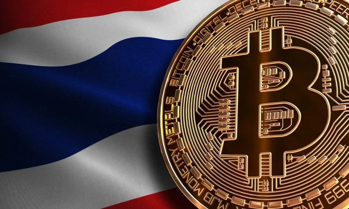 A shiny gold Bitcoin coin rests on a waving red, white, and blue flag, with inscribed text including 'MONETARY METALS' and 'FINE COPPER'.