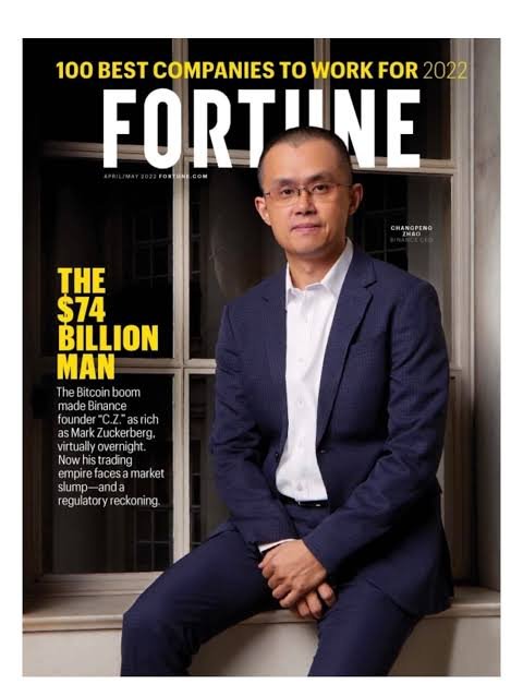 A Fortune magazine cover titled '100 Best Companies to Work For 2022' featuring an article on 'The $74 Billion Man' about Binance founder CZ (Changpeng Zhao).