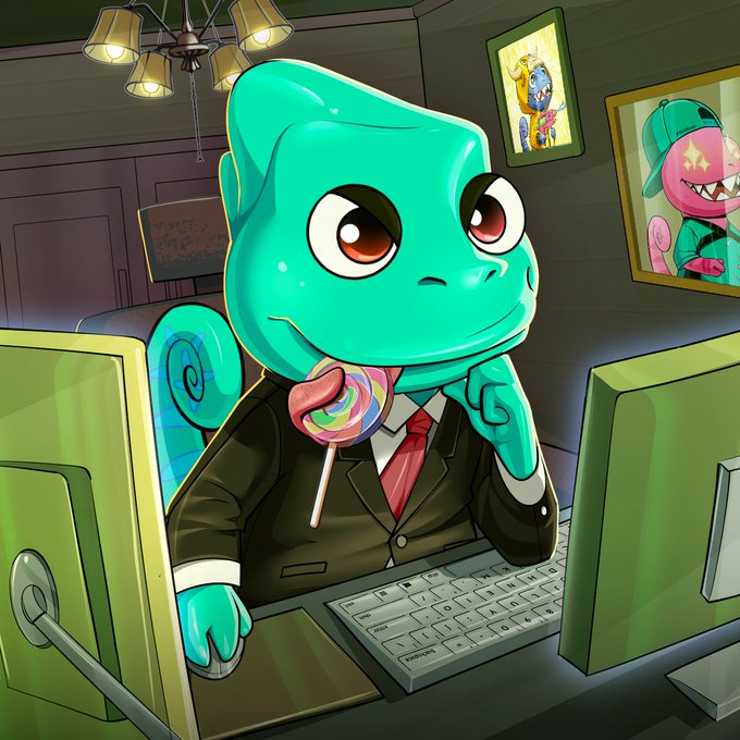 A cartoon illustration of a green chameleon-like character wearing a black suit and red tie, sitting at a desk with dual monitors while licking a rainbow lollipop.