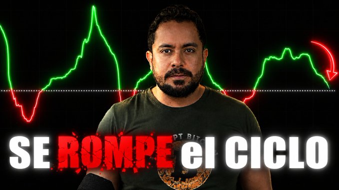 A man with a beard stands in front of a Bitcoin price chart showing a sharp decline, with the bold text "SE ROMPE el CICLO" (The cycle breaks) displayed prominently, suggesting that on-chain indicators are signaling a break from typical bearish market seasonality patterns.