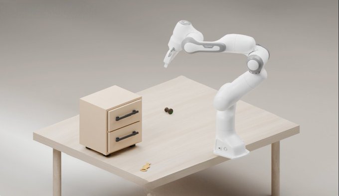 A 3D rendered image of a white robotic arm on a wooden table, reaching toward a small wooden two-drawer cabinet with black handles.