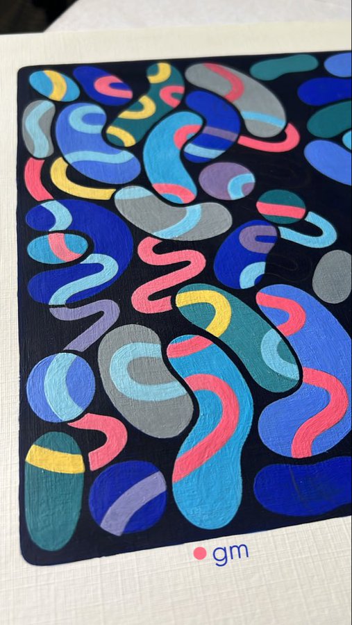 An abstract artwork featuring curved, colorful shapes in blue, pink, yellow, and teal on a black background, signed with 'gm' at the bottom.