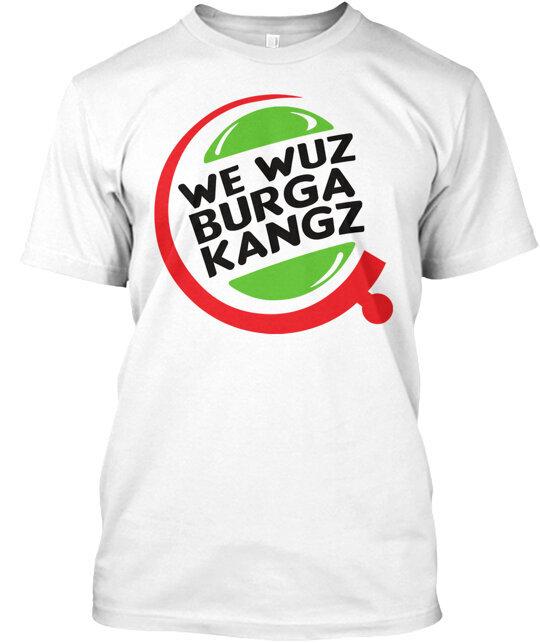 The image features a white t-shirt with black text that reads "We Wuz Burga Kangz", which translates to "We are Burga Kangz". The shirt has a unique design, featuring a red circle on the front with a green ball inside it and the words "We Wuz Burga Kangz" written above and below the circle.