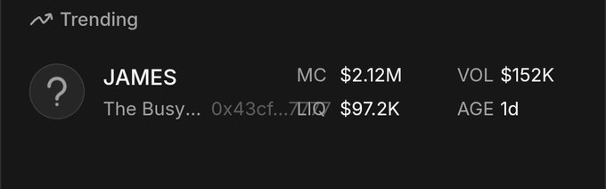 A dark-themed 'Trending' interface displays a token named 'JAMES' with a market cap (MC) of $2.12M, a liquidity (LIQ) of $97.2K, a 24-hour volume (VOL) of $152K, and an age of 1d.