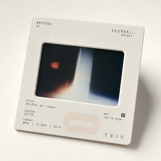 The image shows an old photo frame sitting on top of a white surface. The frame has a black border and a white background, giving it a vintage appearance. The photo inside the frame appears to be a black and white image with a red dot in the center. The text "tezos" is visible in the image as well. The post includes information about an on-chain room, which could be related to the photo or the frame itself.