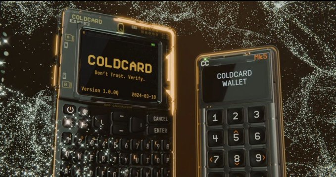 Two Coldcard hardware wallets are displayed against a sparkling dark background, with the left screen showing "COLDCARD Don't Trust. Verify. Version 1.0.00 2024-03-10" and the right labeled "COLDCARD WALLET".