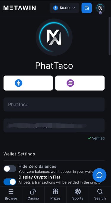 A screenshot of the MetaWin crypto gambling app showing a user profile for 'PhatTaco' with a $0.00 balance, wallet settings for Hide Zero Balances and Display Crypto in Fiat.