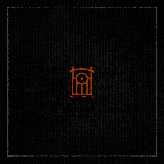 A dark, textured graphic featuring a small orange stylized emblem centered within a distressed square border.