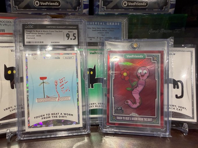 Two graded VeeFriends trading cards ('Tough To Beat A Worm From The Dirt!') displayed in protective slabs, with the left card rated 9.5 by CGC.