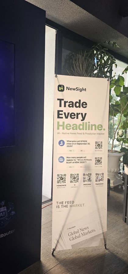 A promotional banner for NewSight stands in an office space, displaying the tagline "Trade Every Headline" and featuring prediction market examples like "What price will #/NQ5 close at on September 30, 2026?" alongside QR codes linking to Homelpage, X, Discord, and Telegram. The banner reinforces the post's message about how NewSight turns current headlines and real-world events into prediction markets, emphasizing "The Feed Is The Market" and "Global News Global Markets."