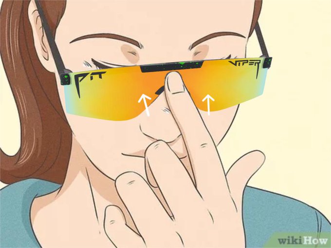 A woman adjusts a pair of orange "VIPER" sunglasses with futuristic designs on the lenses, pushing them up her nose with two fingers, giving off a focused and determined vibe that matches the "time to get serious" mood.