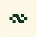 A minimalist logo featuring a stylized, dark green geometric symbol resembling an angular 'N' on a cream background.