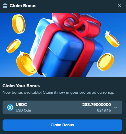 A "Claim Bonus" popup displays a blue gift box with red ribbon surrounded by gold coins, offering a bonus of 283.79 USDC (€248.15) in USD Coin that can be claimed with a single click. The image directly relates to the post by showing the tangible monthly reward amount received from Stake.