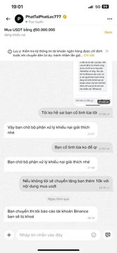 A Binance P2P chat screenshot showing a user (PhatTraPhatHoc777) attempting to buy 50,000,000 USDT for 50,000,000 VND, where the merchant "Binance Viet" repeatedly asks for payment proof and accuses the buyer of not transferring, while the buyer claims to have sent the money and the merchant has "duyệt" (approved) but not received it.
