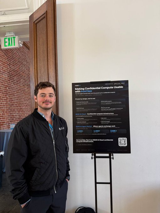 A man stands next to a research poster titled "Making Confidential Compute Usable with IronClaw," presented at the Confidential Compute Summit, where he discussed NEAR AI Cloud and the IronClaw Agent Market, citing metrics like 1,500+ GitHub stars, 4,400+ forks, and $36K+ in funding.