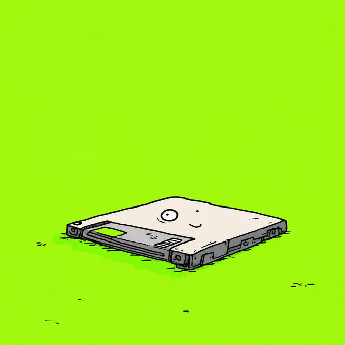 A floppy disk with a winking face drawn on it sits on a green background, playfully matching the cheeky "hehe" caption with its mischievous expression.