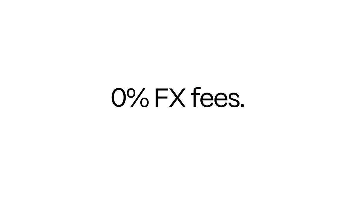 A white screen with black text reading '0% FX fees.'