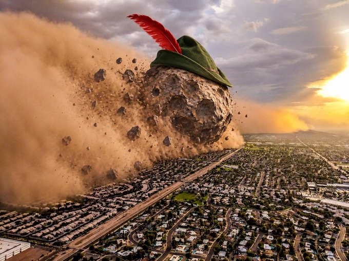 A massive cratered asteroid wearing a green Robinhood hat with a red feather crashes into a suburban neighborhood, sending debris and dust into the air at sunset—visually symbolizing the company's impact on the blockchain. The apocalyptic imagery parallels the post's description of "Robinhood hit on-chain like an asteroid," using the destructive collision as a metaphor for Robinhood's disruptive entry into crypto/blockchain markets.