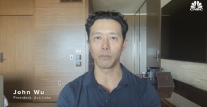 CNBC interview screenshot featuring John Wu, President of Ava Labs, shown in a hotel room setting.