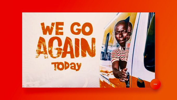 A vibrant red and orange graphic with a smiling man looking out from a tuk-tuk window, paired with the bold text 'WE GO AGAIN TODAY'.