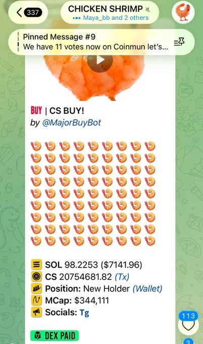 The image features a cell phone screen displaying a message from an AI assistant, possibly via social media or another messaging platform. The phone is positioned at an angle with a green background. In the message, there is text related to a shrimp, likely a recipe. It appears that someone is sharing a message about buying chicken and shrimps on a website called CS buy! This post encourages people to purchase these items as they are "awardable". The content of this message seems quite interesting as it combines information about cooking with a bit of humor in the form of an emoji for followers.