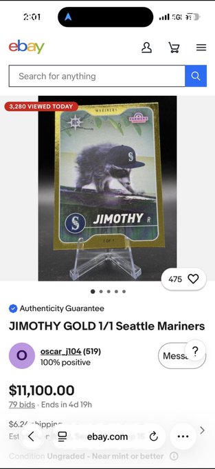 A screenshot of an eBay listing shows a gold 1/1 "JIMOTHY" Seattle Mariners baseball card currently at $11,100.00 with 79 bids and 4 days 19 hours remaining. The image directly supports the post's claim about the card's high-value auction and its potential impact on $Jimothy's market cap.