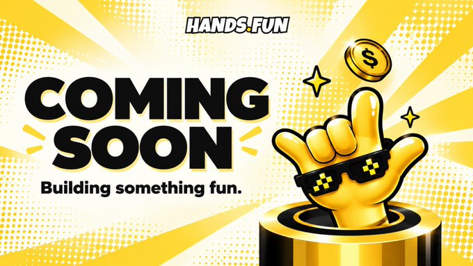 A promotional graphic with a yellow background displays the text 'HANDS FUN COMING SOON Building something fun.' alongside an illustration of a yellow hand wearing pixelated sunglasses and a gold coin.