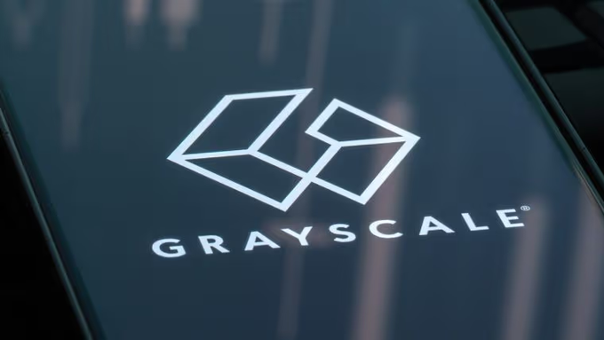 The Grayscale logo displayed on a glass surface.