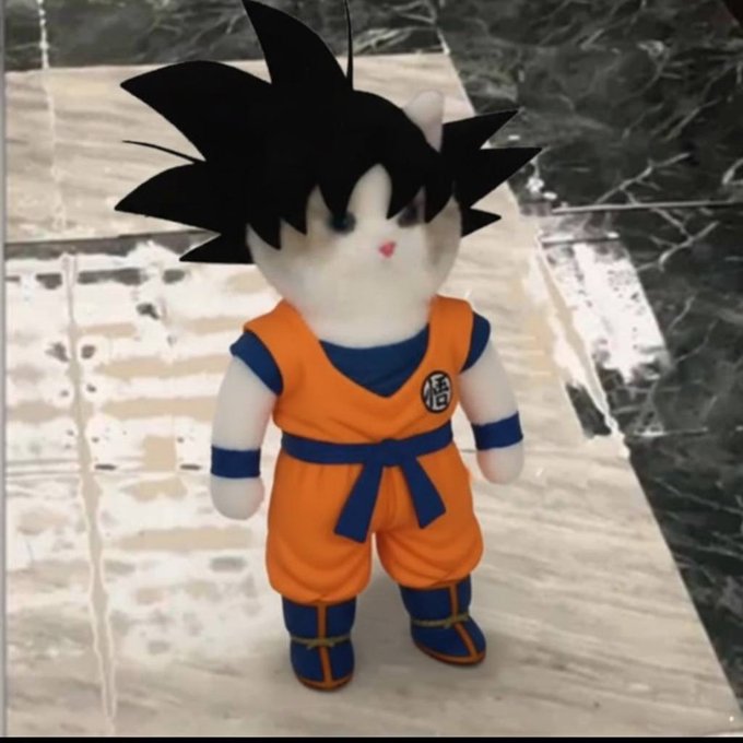 A plush toy of a white cat with spiky black hair, dressed in an orange and blue martial arts gi featuring the "悟" (Go) kanji symbol, standing on a marble-patterned floor. The image ties to the post by personifying the "$MIU" cat meme as a Goku-style character, playing off the reference to "$WIF" (the dog coin) and positioning "Miu" as its feline counterpart.