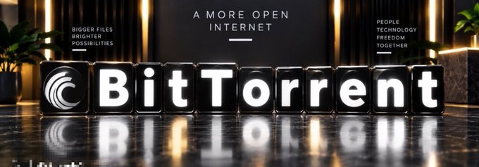 A promotional image for BitTorrent features its logo and name in large white letters, reinforcing the post’s point that internet content requires efficient discovery and access beyond storage. The backdrop reads “A MORE OPEN INTERNET,” alongside “BIGGER FILES. BRIGHTER POSSIBILITIES.” and “PEOPLE TECHNOLOGY FREEDOM TOGETHER.”
