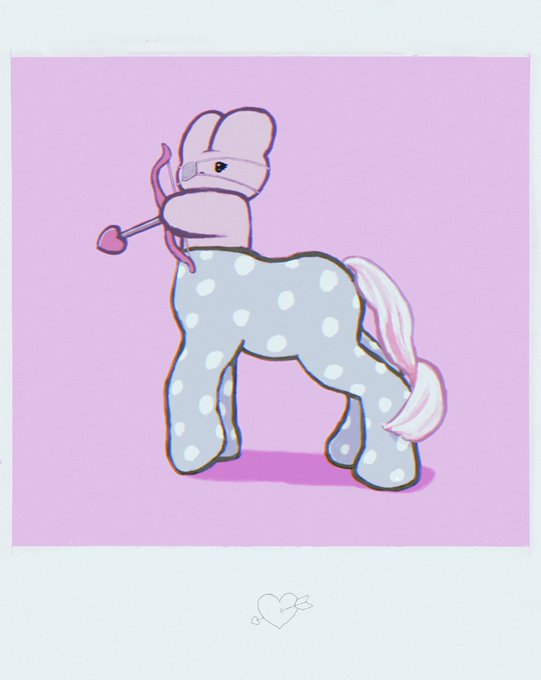 A whimsical illustration shows a cute plush-style pony with a grey polka-dotted body, pink mane and tail, and a heart-tipped arrow piercing through its head against a soft pink background, with a small drawn heart at the bottom. The image ties into the "Memetaurus" meme by depicting the playful, toy-like aesthetic typical of character-based meme coin art, blending cute mascot imagery with the lighthearted internet culture that "Memetaurus" represents.