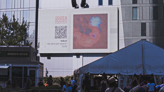 An outdoor event scene showing a large digital screen displaying 'BOOTS & PARTY SUPPLY' with a QR code, an abstract artwork, and the quote 'Ad astra per aspera' 2025, with a blue tent and crowd below.