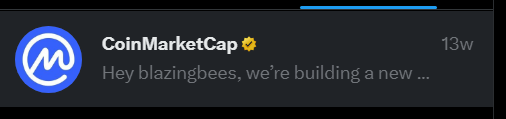 A notification from CoinMarketCap reads "Hey blazingbees, we're building a new..." with the account marked by a verified checkmark and a blue "M" logo, dated 13 weeks ago. This image relates to the post by showing the unsolicited message from a major cryptocurrency platform that the user received despite having no interest in crypto.