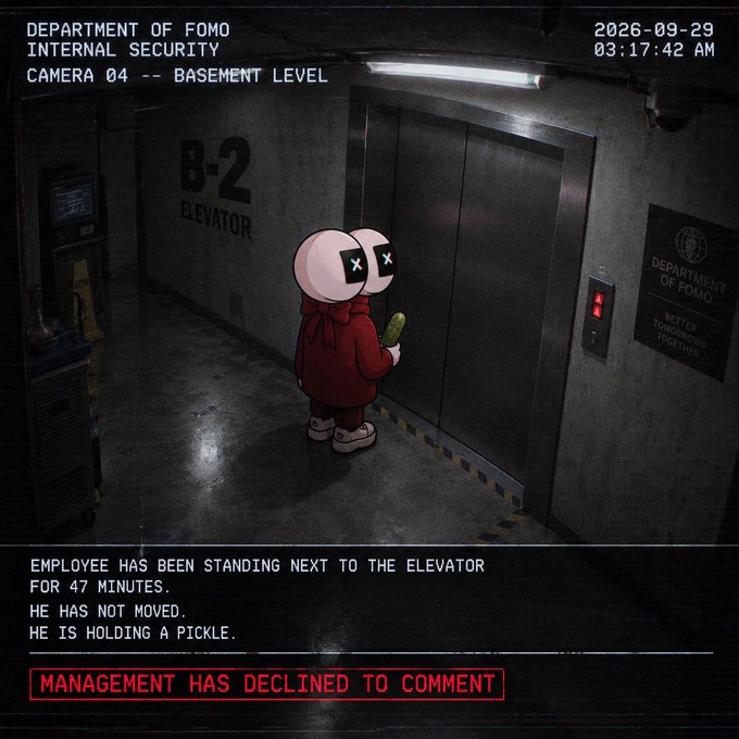 A creepy surveillance-style image shows a cartoon character in a red jacket and mask holding a pickle, with text reading 'EMPLOYEE HAS BEEN STANDING NEXT TO THE ELEVATOR FOR 47 MINUTES. HE HAS NOT MOVED. HE IS HOLDING A PICKLE.' and 'MANAGEMENT HAS DECLINED TO COMMENT'.