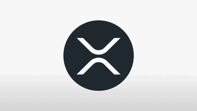 The image displays the dark circular XRP logo, featuring its distinctive stylized "X" design, which ties into the post's discussion about Ripple issuing 10 million RLUSD on the XRPL (XRP Ledger). The logo serves as a visual representation of the XRP ecosystem being referenced in the news about Ripple's latest stablecoin activity.