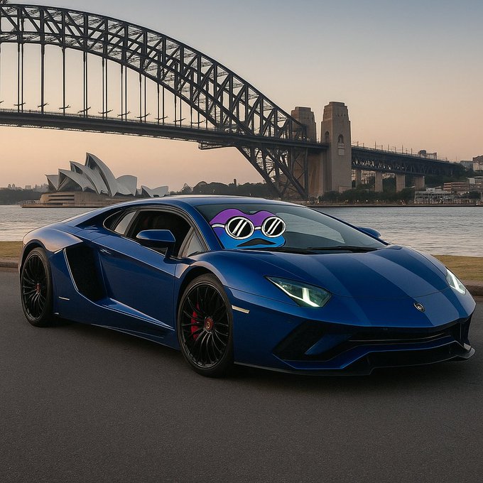 A blue Lamborghini Aventador parked in front of the Sydney Opera House and Sydney Harbour Bridge, with a cartoon face edited onto the windshield.
