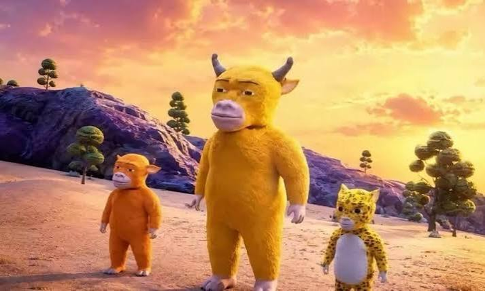 An animated scene featuring three costumed characters—a large yellow bull, a smaller orange pig, and a leopard—standing in a sandy landscape at sunset.