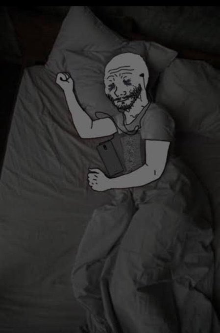 A dark, meme-style image showing a bald, bearded figure drawn in the 'wojak' style lying in bed and holding a smartphone, with a dark, melancholic atmosphere.