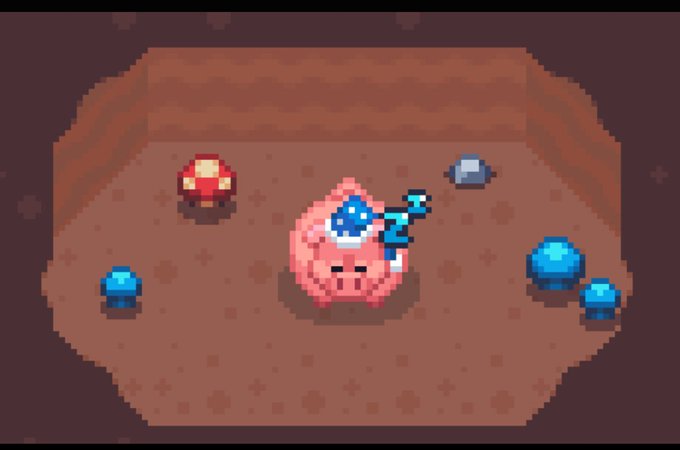 A pixel art scene showing a small character in a blue wizard hat next to a large pink creature, surrounded by mushroom-like objects in a cave setting.