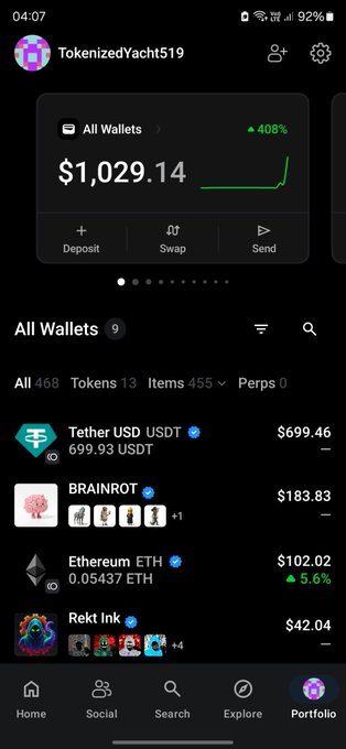 The image shows a mobile crypto portfolio screen for "TokenizedYacht519" displaying an "All Wallets" balance of $1,029.14 with a 408% gain, listing holdings like USDT ($699.46), BRAINROT ($183.83), ETH ($102.02), and Rekt Ink ($42.04), with navigation tabs for Home, Social, Search, Explore, and Portfolio at the bottom. The screenshot illustrates the post's point about OpenSea's all-in-one app, as it showcases a unified dashboard where users can manage deposits, swaps, and their entire crypto portfolio from a single interface—no more juggling multiple dapps.