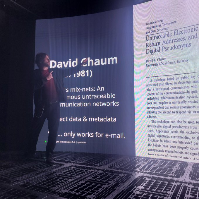 urns are displayed on a blue screen, accompanied by text about David Chaum's work and the "only works for e-mail" message.