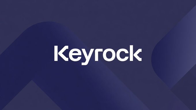 The image displays the Keyrock logo in white text against a dark blue background with abstract curved shapes. It accompanies an announcement about Keyrock's acquisition of BlockFills' institutional trading and brokerage operations, serving as the company's branded visual identifier for this corporate news.