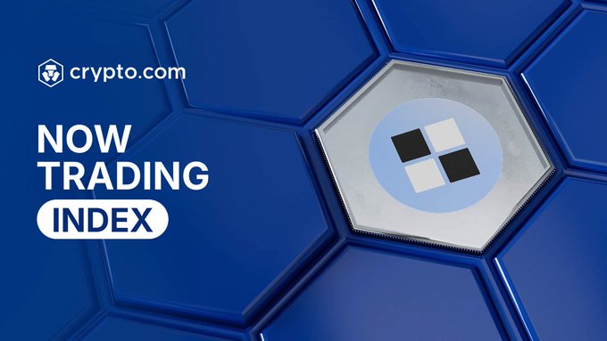 Crypto.com announces that The Index ($INDEX) is now available for trading in its app, with a bold “NOW TRADING INDEX” graphic and the Crypto.com logo.