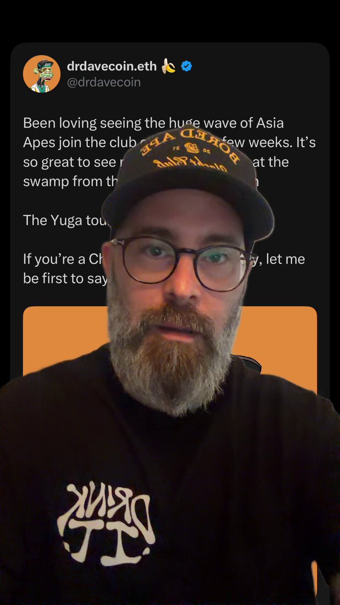 The image features a man wearing glasses, a black shirt, and a hat. He has a beard and appears to be sitting down or standing still. The caption of the image reads "Dr. Davilaeth @BoredApeYC". This suggests that the person who posted this image is interested in engaging with others on social media platforms like Twitter.